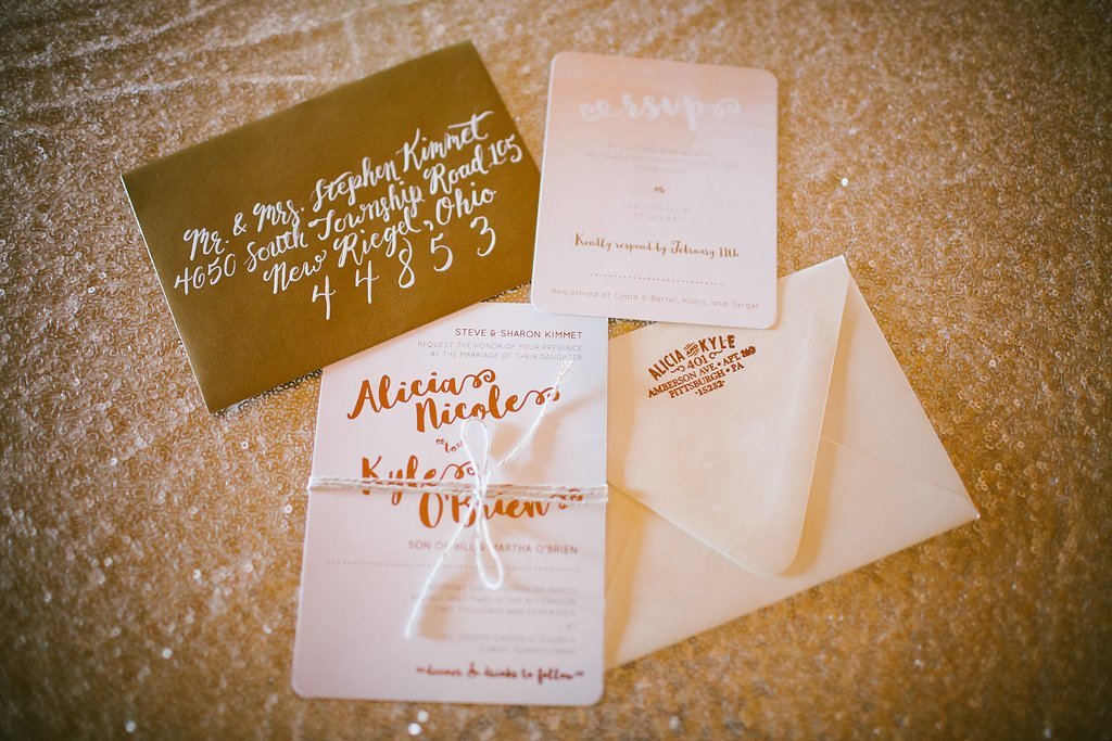 Custom wedding invitation suite with rose gold foil and modern calligraphy